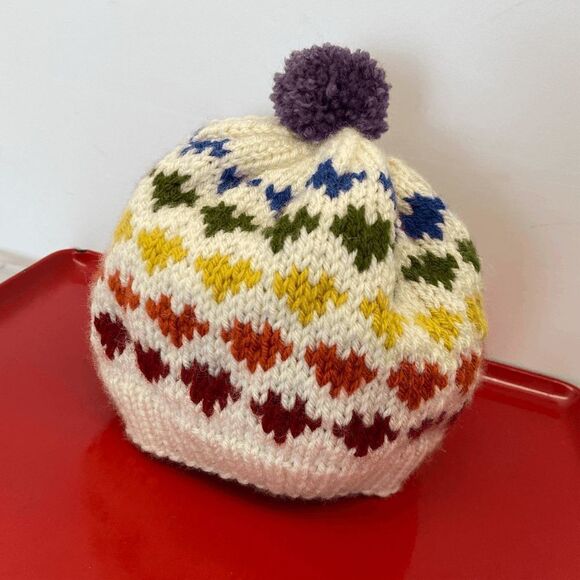 Rainbow Hearts Hand Knit Pom Pom Beanie, Winter Hat with Heart Design in Rainbow - Picture 7 of 8